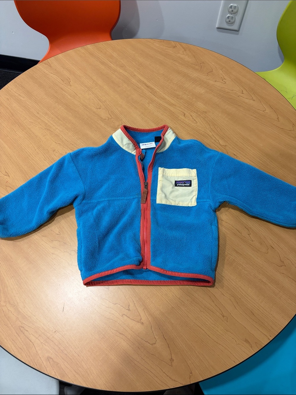 Patagonia Kids Bright Blue Fleece Jacket with Cream Pocket and Orange Trim